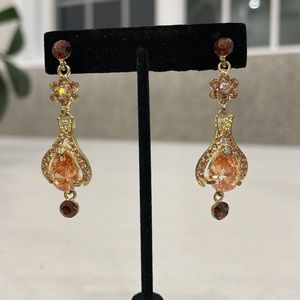 Amuse gold tone chandelier earrings with peach and topaz crystals